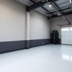 Professional applying epoxy resin floor coating to a concrete surface for a durable finish